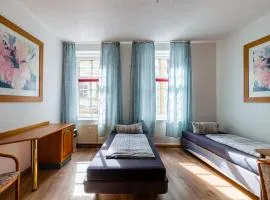 Ein Zimmer im 3-Raum-Apartment in Merseburg mit Gemeinschaftsküche und -Bad