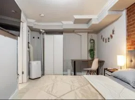 Private Room at a shared apartment by Times Square