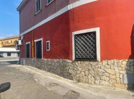 Red House- Accogliente appartamento vicino al porto, hotel in Civitavecchia