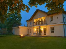 Gulbės Apartamentai, hotel na praia em Anyk&scaron;čiai