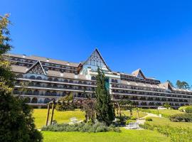 Apartamento no Quatre Saisons com Café da Manhã, beach hotel in Campos do Jordão