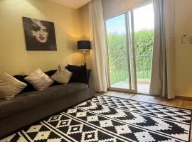 Zayed Elite Retreat pool, garden & breeze