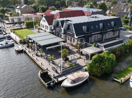 Appartementen De Helling 44, hotel con tinas de hidromasaje en Heeg