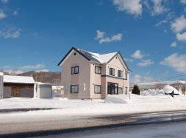 Rusutu,Ski&Family Lodge 66, hotel con campo de golf en Kimobetsu