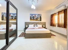 Touraco Suite H&ocirc;tel Business，姆布爾的住宿