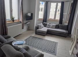 Appartement spacieux avec parking et terrasse, ξενοδοχείο σε De Panne