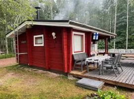 Mökki ja saunamökki Kurjenrahkan kansallispuistossa