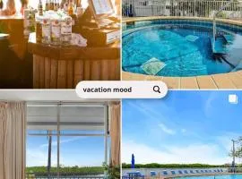 Watch the dolphins Large balcony Suite and heated pool