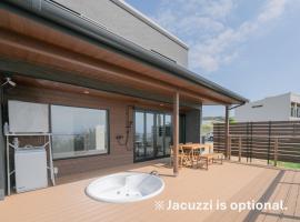 新築オーシャンビュー離れ FLAG Awaji HANARE, hotel com banheiras de hidromassagem em Awaji