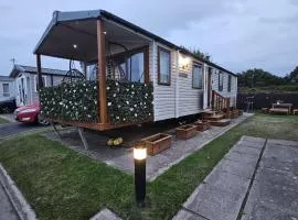 Rhyl Caravan with Veranda Egg Chairs & Garden