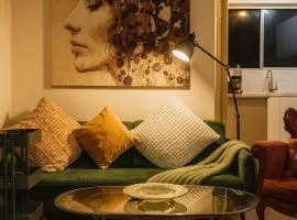 Nestled Away - A retro cozy nook - With TV Projector and Luxury Sealy mattress