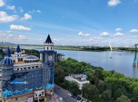 Central Street River View Apartment, alojamiento en Harbin