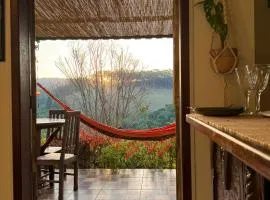 Refúgio com Vista do Pôr do Sol Piscina e Sauna