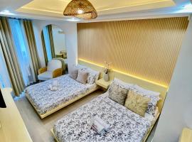 1 Bedroom NAMI Suite Japandi-Inspired by THE BALI CORNER AT AZURE NORTH, CORNER UNIT with BIG Balcony and Amazing FULL view of the Beach Resort Amenities, hotel San Fernandóban