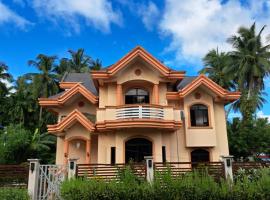 Tungkip House Bed and Breakfast, hotel u gradu Llorente