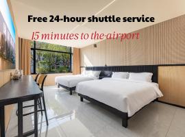 Shanghai Zhuzhu Hotel - 24-hour free airport pick-up and drop-off at Pudong Airport, hotel que aceita pets em Xangai