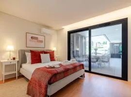 Premium Apartment w/ Garage & Balcony by HostWise