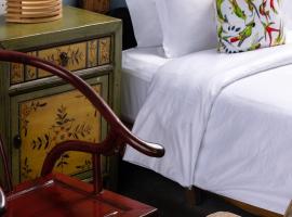 Huazhu Xizhai Hotel, hotel din Qionghai