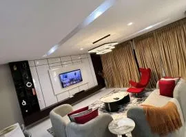 Trendy 2-BDR Apt Villa with Pool,Wi-Fi, Netflix, Modern Amenities & PS5 Near Elegushi Beach Lekki