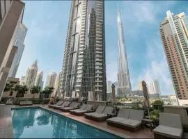 Restay Homes at Act Towers - Pool access with Burj View