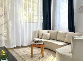 Lofty 1br Milimani with AC, hotel in Kisumu