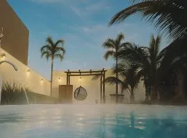A Casa Paradisíaca ll Luxo Piscina Super Mega Quente até 50 graus Aquecimento Elétrico e Solar Casa com Sauna a Vapor e Lavanderia com Roupa de Cama e Banho