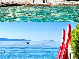 Luxury Seaside Villa with a classic Mediterranean Olive Garden, a fully equipped Professional Kitchen, Pool, Sauna, Padle Boards and Canoe - Miolin Beach House