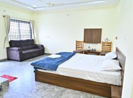 RK Comforts, hotel en Belūr