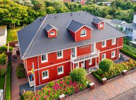 Schwedenhus 2 für 12 Personen, hotel in Wangerooge