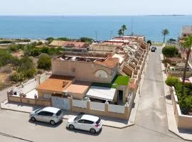 CASA Adosada obra nueva Calas santa pola del este 50 metros del mar