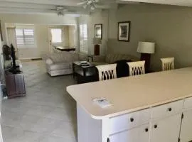 Steps to Sand Ground Floor Condo in Quiet Oceanfront Community