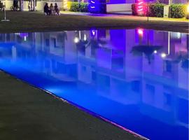 Appartement vu sur piscine à 5 minutes de la plage, hôtel à Minaret de Mansuria