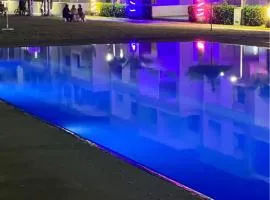 Appartement vu sur piscine à 5 minutes de la plage