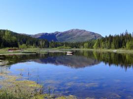 Velfjord Camping & Hytter, хотел близо до Torghatten Mountain, Velfjord