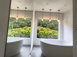 Mirador samsara Suite Luxury Tina vista a la montaña