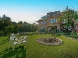 SaffronStays Awakening Deluxe Rooms