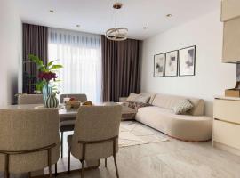 Qoople Legend C - apartments in Alanya 100m to the sea, hotel com banheiras de hidromassagem em Alanya
