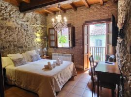 El Juacu, kúria Llanesben