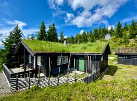 Cozy spacious cabin with sauna at Natrudstilen, hotel in Ringsaker