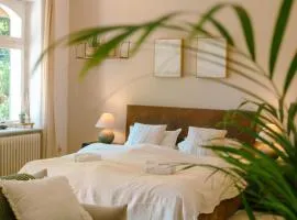 Big-size Bett Gartenapartment