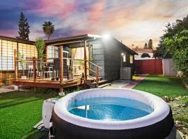 Entire Private 1-Bedroom Home with King Bed, Hot Tub, Parking, View, Available Now