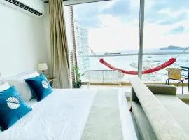 "Blue loft Oceanview Minimalist Studio in Marina Rooftop Pool Prime Location"