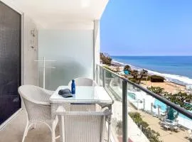 Oceanfront Gem w Balcony Pool Hot Tub Carbon Beach Access Bluewater Haven by AvantStay