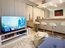 Royce Staycation - Trees Residences Cozy unit with PS4, מלון במנילה