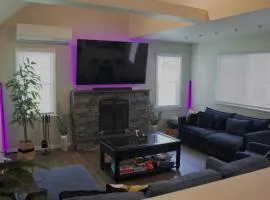 Cozy Pocono Home with a Hot Tub, Fire pit, Games and more!