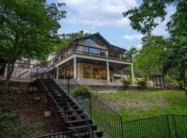 Luxury Riverfront Villa with Firepit & Gameroom!