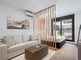 Exclusivos apartamentos con terraza privada, piscina, gimnasio y coworking