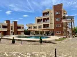 Sally Beach Hotel Yenne, serviced apartment in Siendou