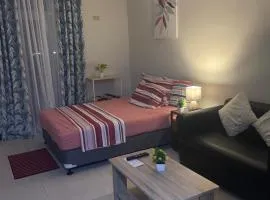 Spacious studio with balcony and guest parking