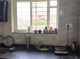 Hygge, hotel i Māngaon